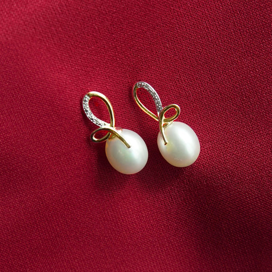 Aretes oro 14K con 2 puntos de diamante y perlas